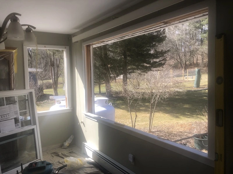 HEPA vacuum being used during window replacement